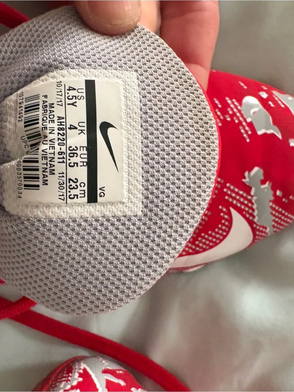 Nike Red and White Youth 4.5 Cleats with Yellow Sole Accents